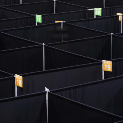 Numbers and letters are displayed on room dividers at the UMass Memorial Health Care field hospital at the DCU Center in Worcester, Massachusetts, U.S., on Wednesday, April 15, 2020. Covid-19 has infected 2 million people around the world as the new coronavirus marks another grim milestone. Photographer: Adam Glanzman/Bloomberg via Getty Images